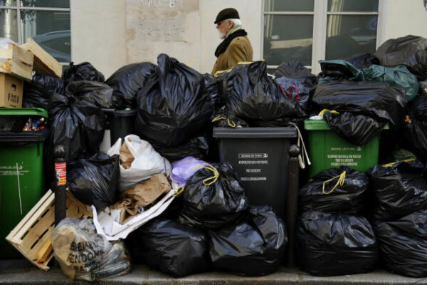 France's streets are filled with garbage and fury. Here's why.